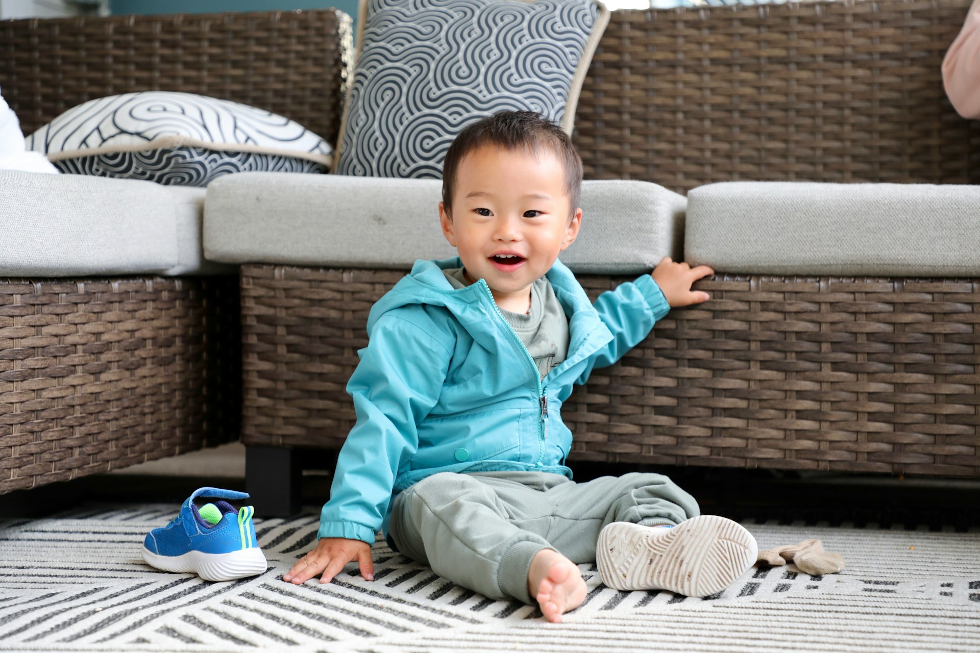 Little boy smiling in living room